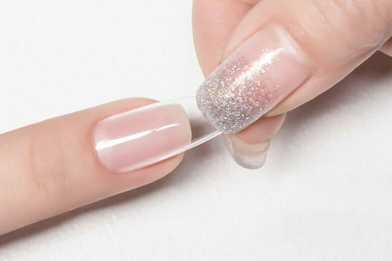 how to get nail glue off skin