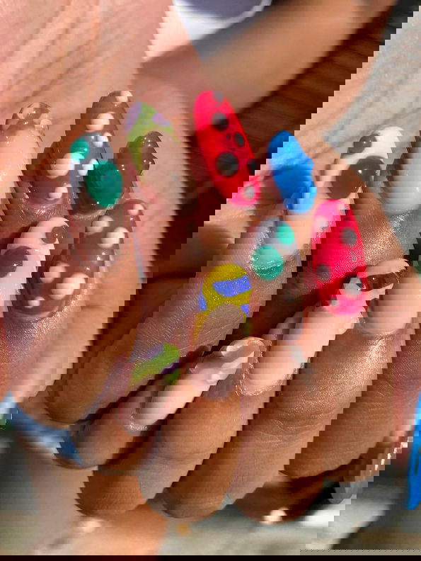 nude nails with colourful 3D art