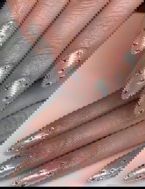 short chrome stiletto nails with gems