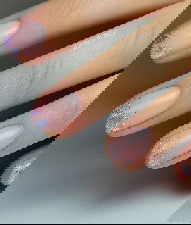 short nude nails with subtle ombre sparkle