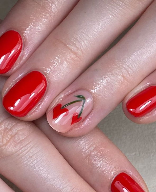short red nails with cherry nail art