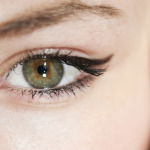 Professional woman with makeup on showing how women are expected to wear makeup to work