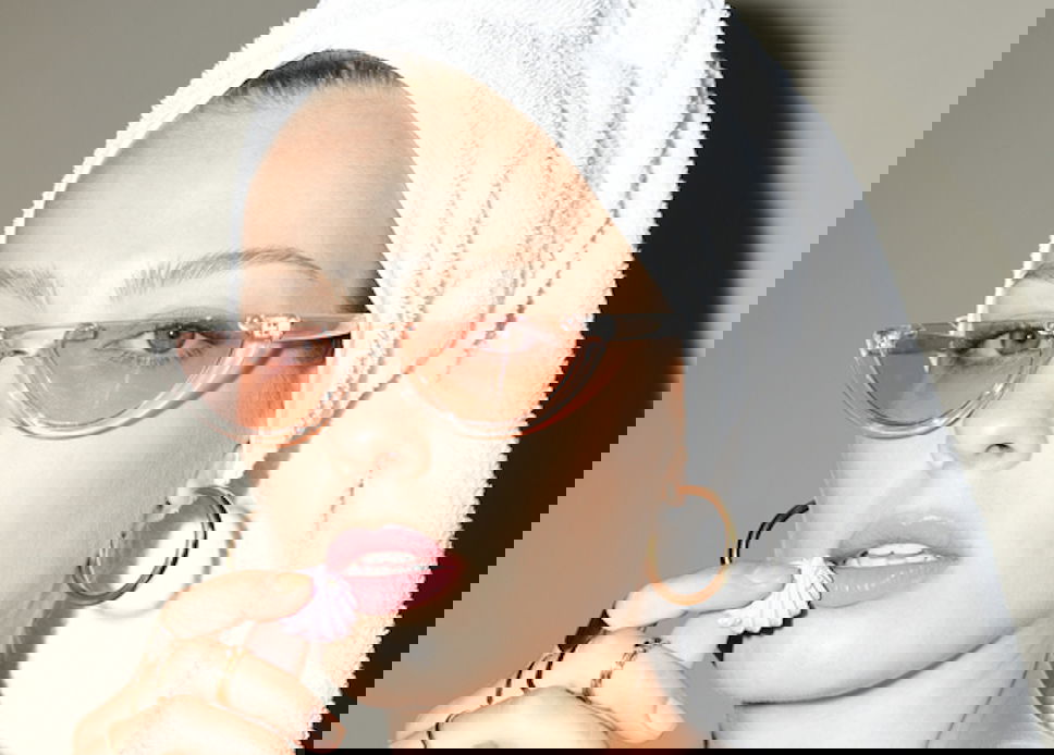 Woman getting ready to use a facial steamer