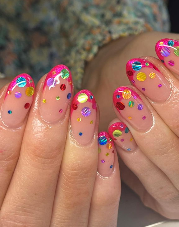 sparkle pink french tip nails with confetti glitter