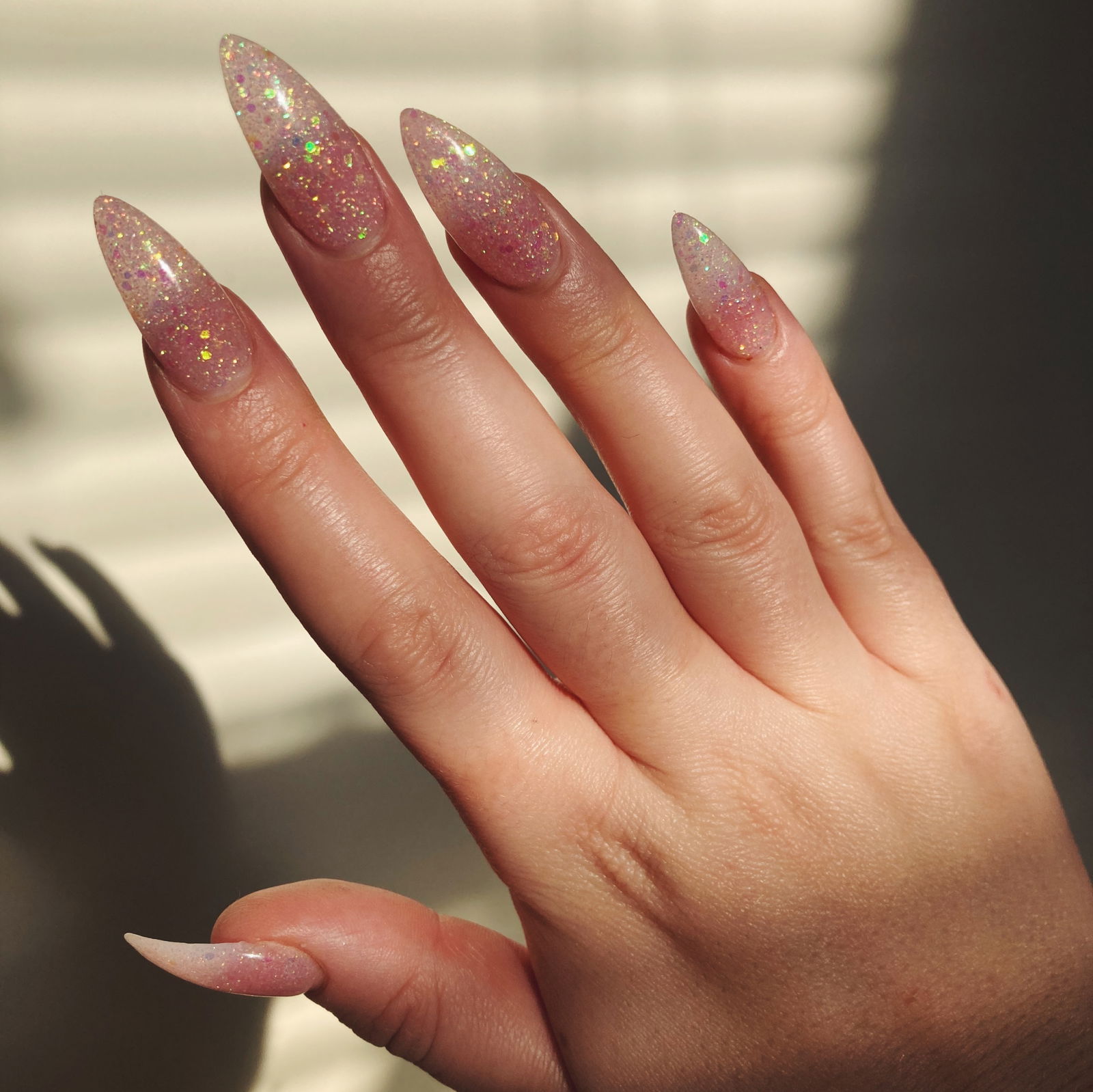 Journalist Annie Walton Doyle shows her clear nails