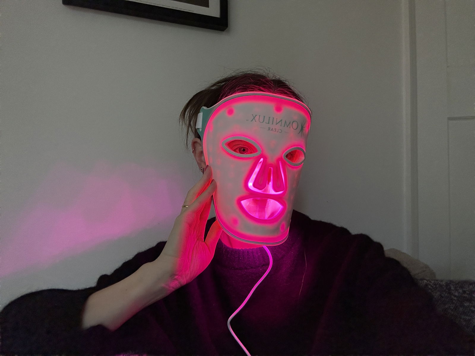 Journalist Grace Day with LED face mask on