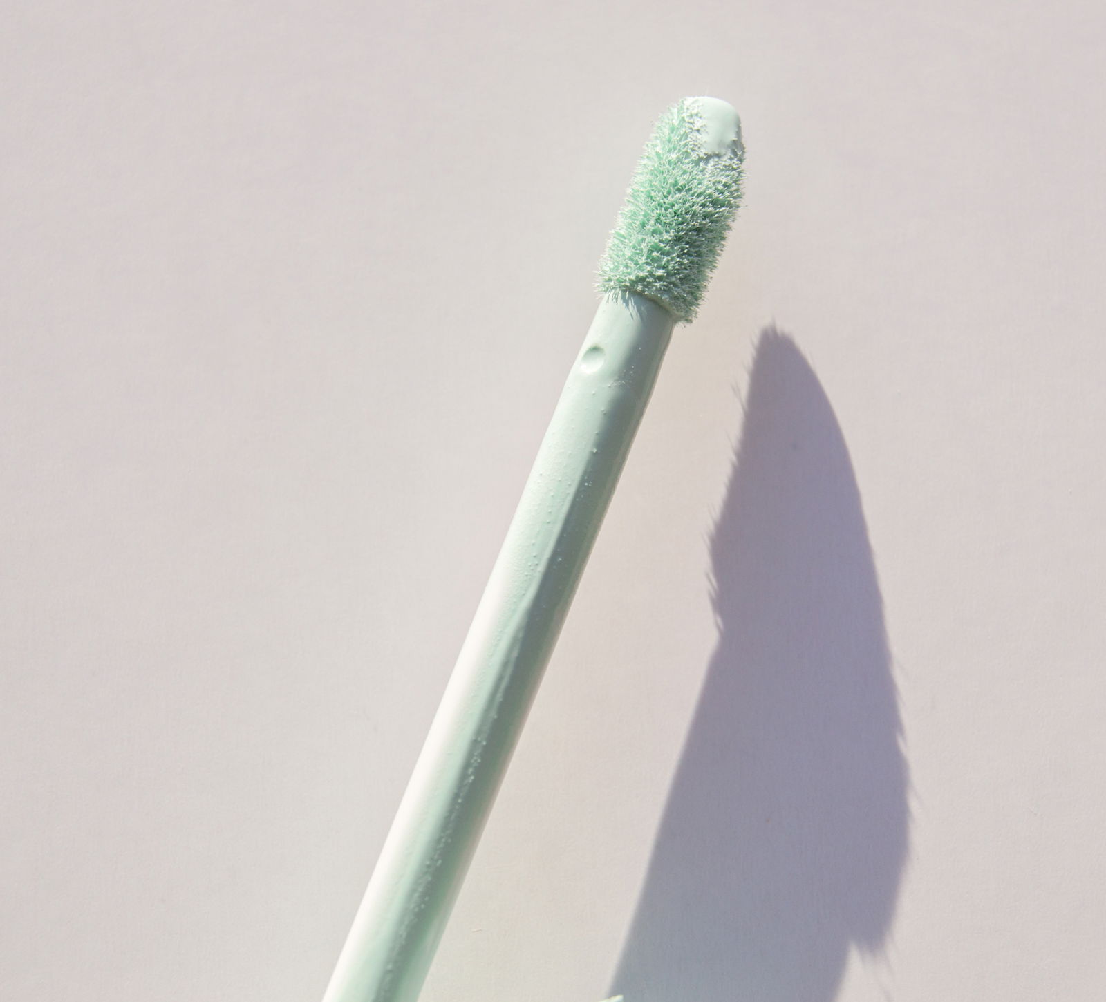 Colour correcting concealer showing how to cover up acne redness