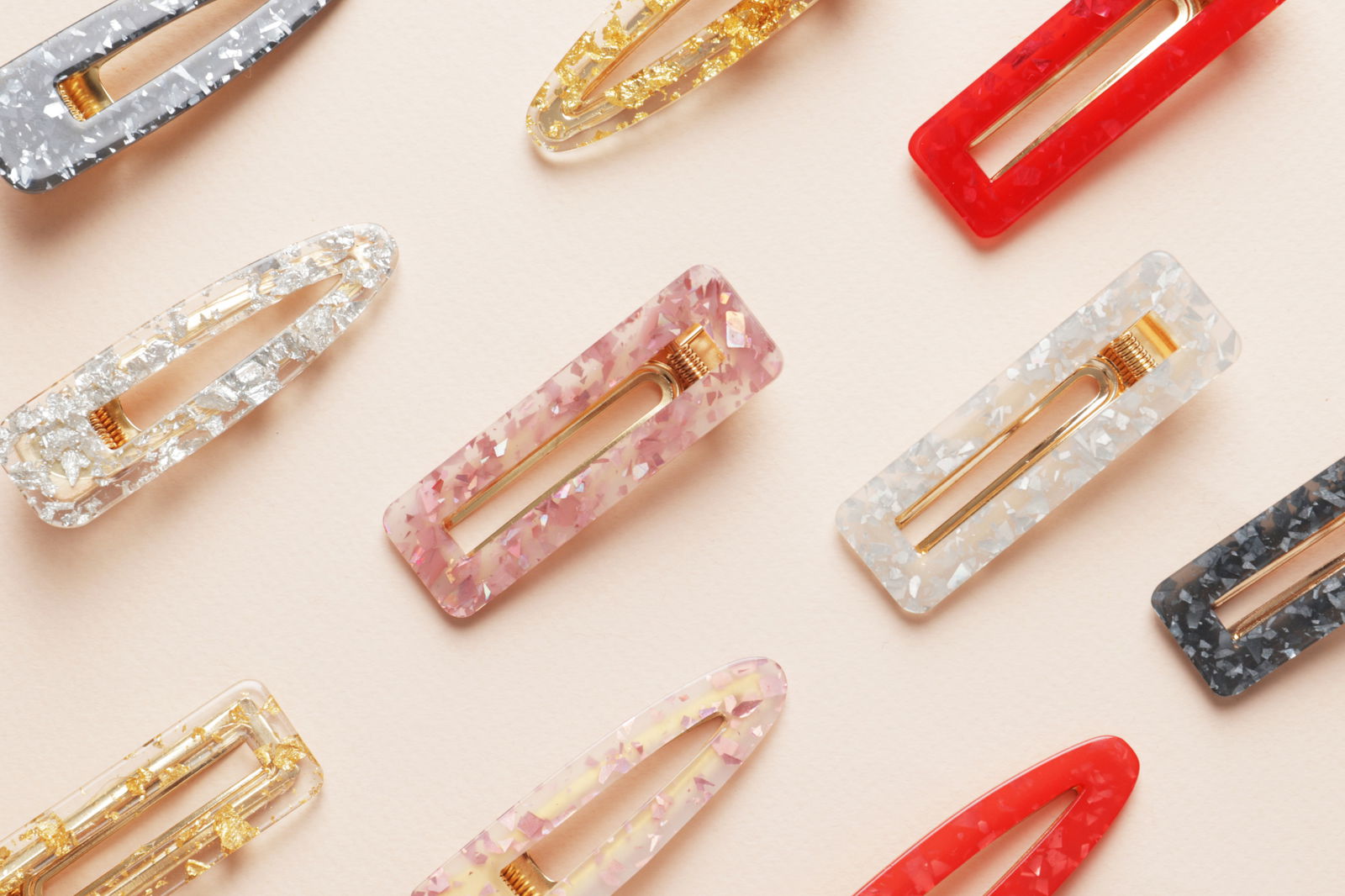 Hair clips showing importance of putting your hair up to prevent back and shoulder acne