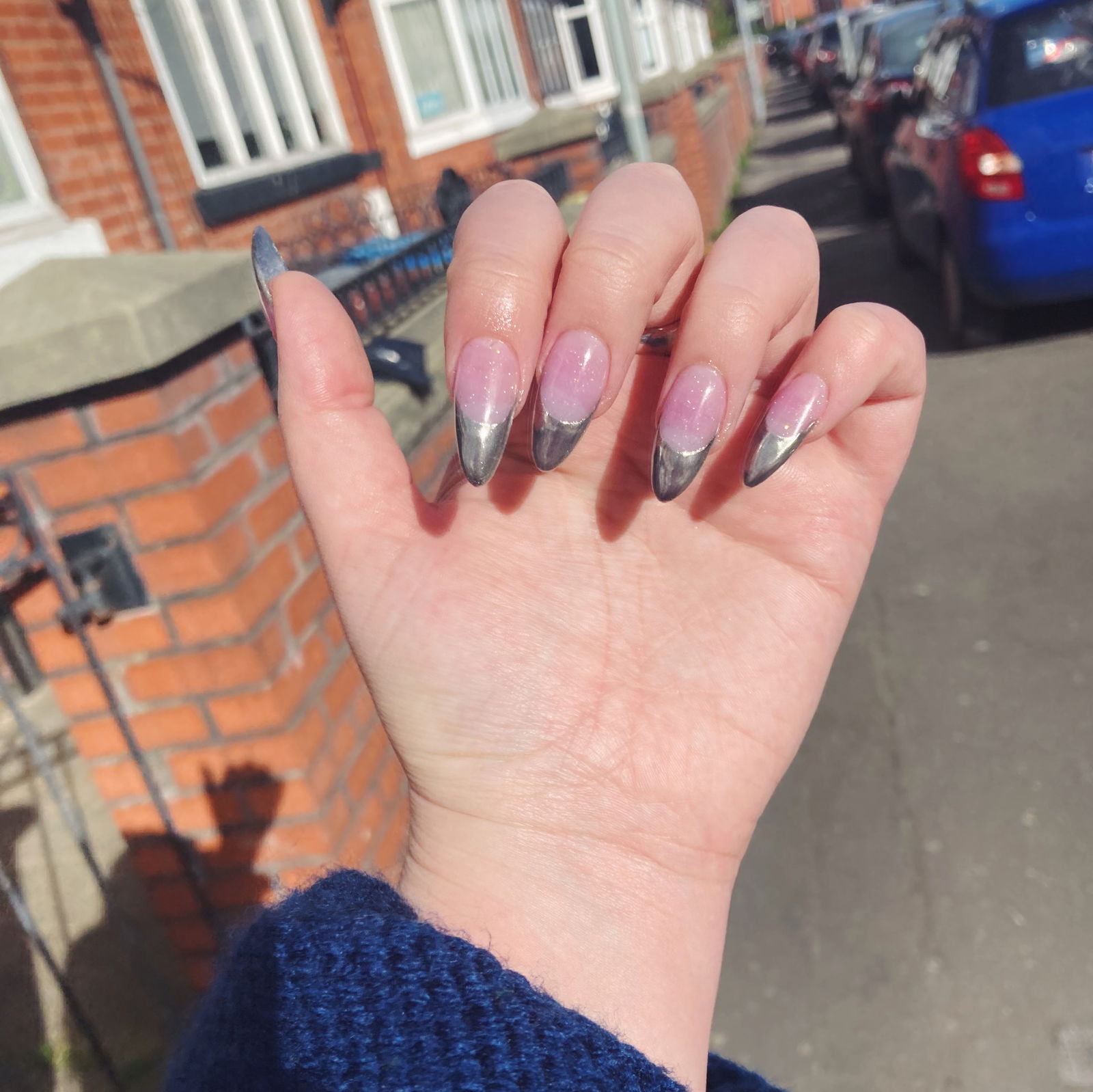 Journalist Annie Walton Doyle shows her silver nails