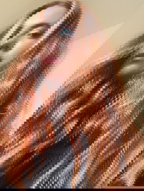 Journalist Annie Walton Doyle with red hair