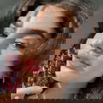 Woman wearing hair clips showing popularity of hair accessories