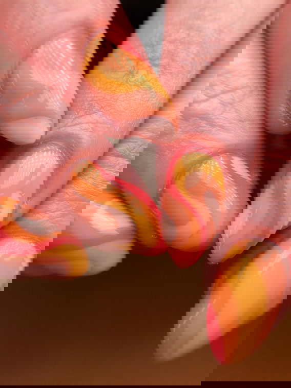 orange swirl almond nails