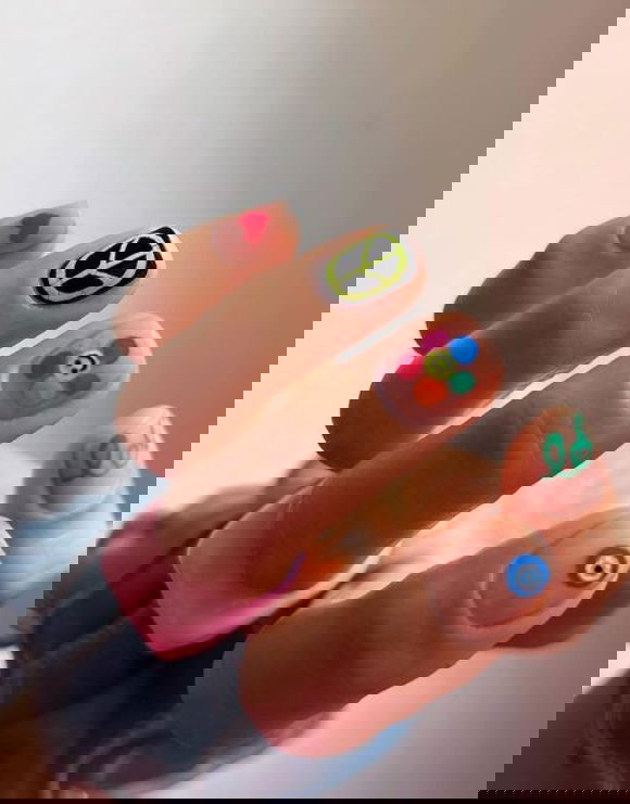 90s flower power doodle nails