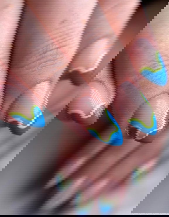 wavy blue french tip nails