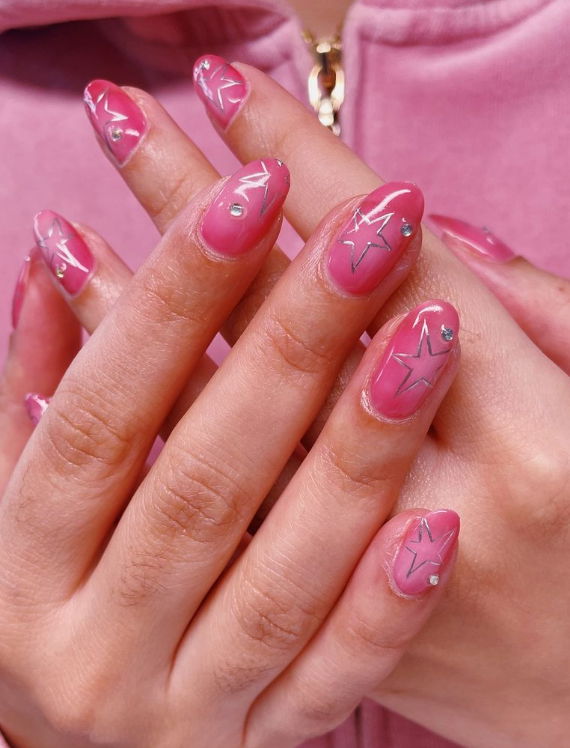 aura ombre pink nails with silver chrome stars