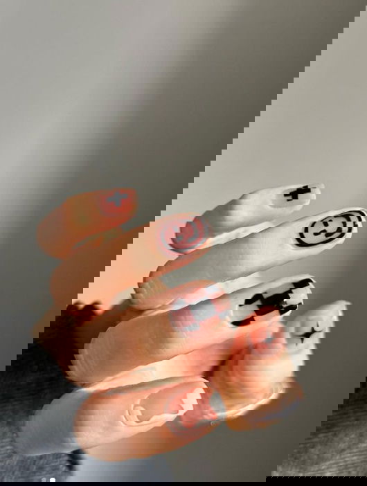 black and negative space checkered nails