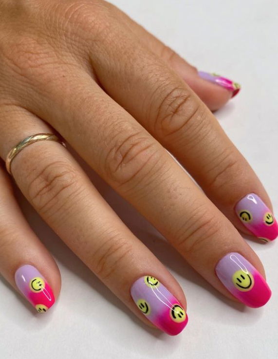 pink and lilac ombre smiley face nails