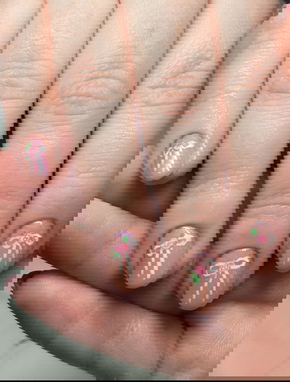 nudee nails with pink bows