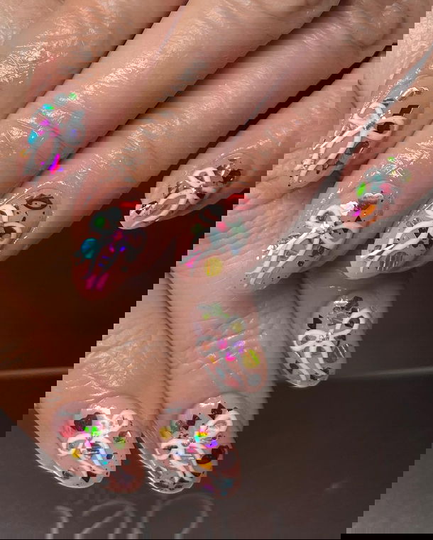 confetti nails with white bows