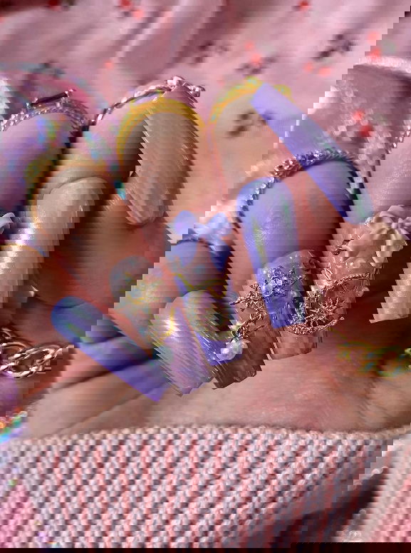 lilac chrome bow nails